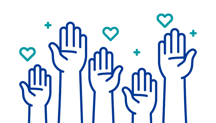 Female healthcare provider using stehescope on young girl while mother observes