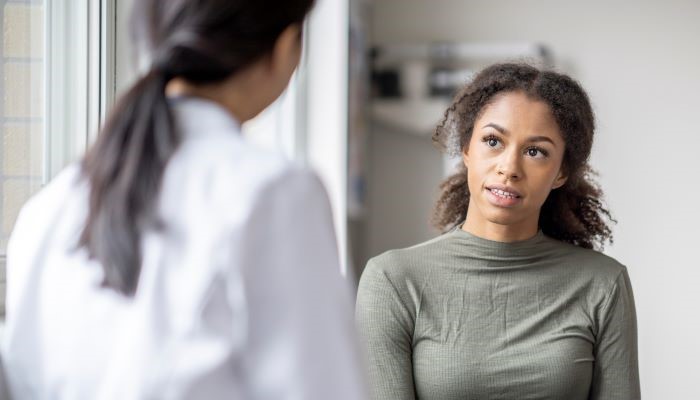 Patient talking to doctor