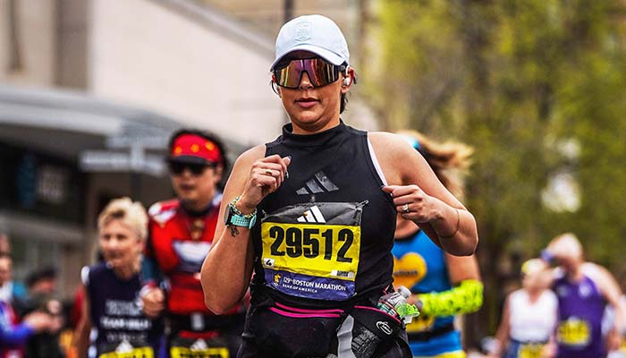 A marathon runner in sunglasses