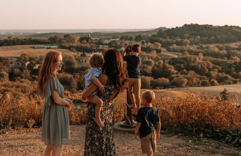BWH neurosurgery patient Nicole Haight standing with her children