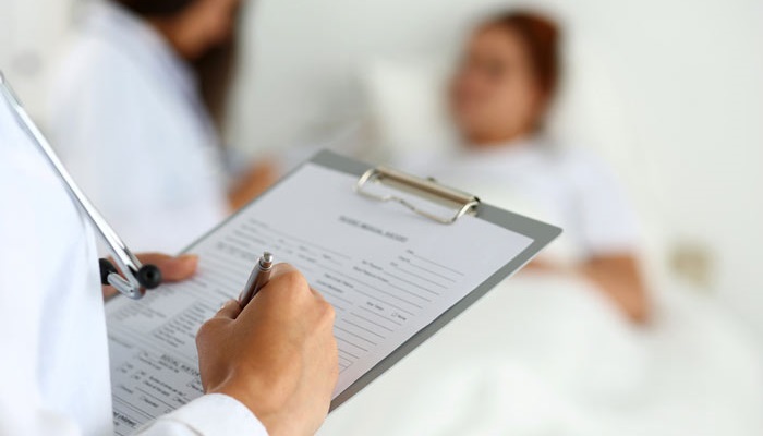 Doctor with clipboard